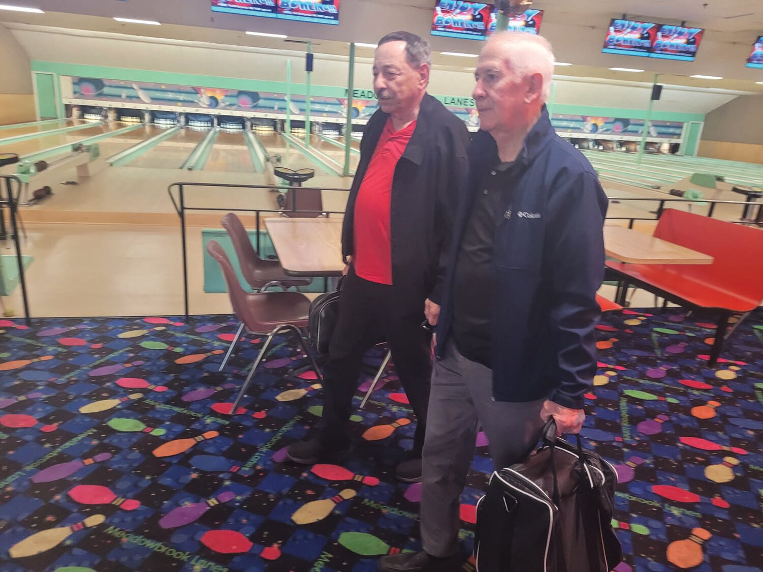 MEMORY LANES: Retired U.S. Army Sgt. John Tammelleo and Corp. Mario DeAngelis, both of Johnston, are bowling buddies and Vietnam War-era veterans. On Sunday, they’ll be among 55 Ocean State veterans aboard a RI Honor Flight to Washington D.C.